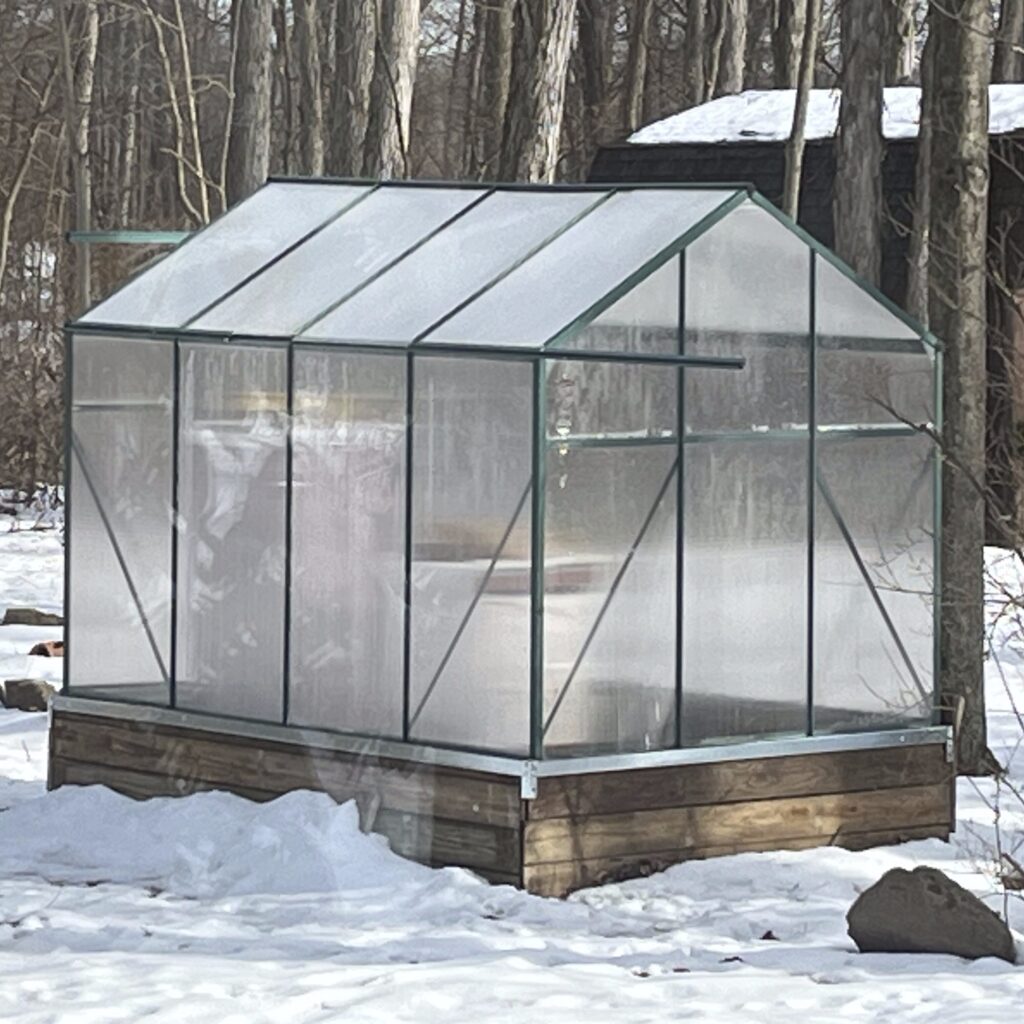 Greenhouse covered in snow